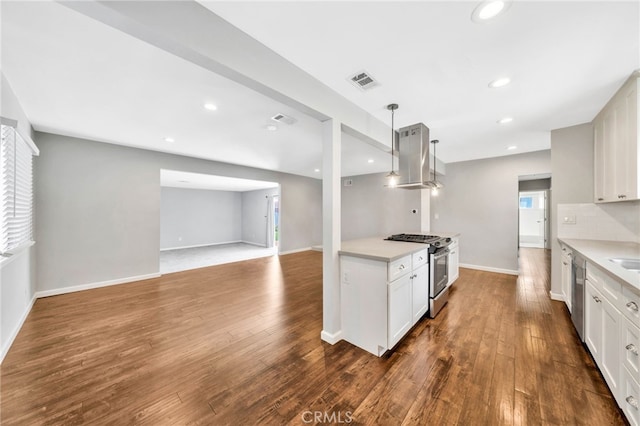 425 E Wilson Ave, Orange, CA 92867 - kitchen with stainless steel appliances, ventilation hood, dark wood-type flooring, light countertops, and recessed lighting