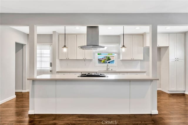 425 E Wilson Ave, Orange, CA 92867 - kitchen with extractor fan, cooktop, dark wood-style flooring, light countertops, and recessed lighting
