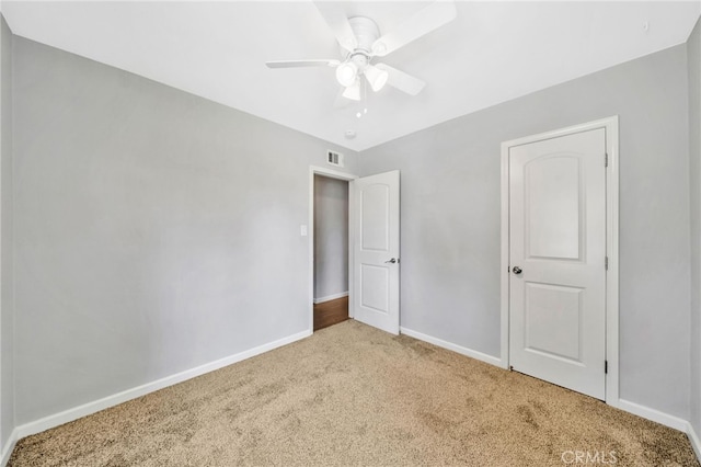 425 E Wilson Ave, Orange, CA 92867 - unfurnished bedroom with carpet flooring and ceiling fan