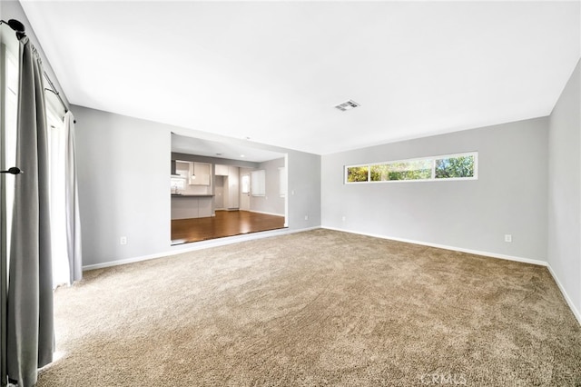 425 E Wilson Ave, Orange, CA 92867 - unfurnished living room with carpet