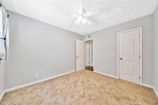 425 E Wilson Ave, Orange, CA 92867 - unfurnished bedroom with carpet flooring and ceiling fan
