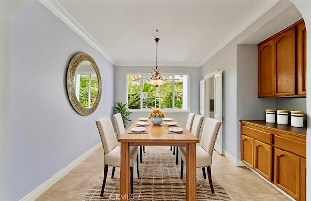 2938 Calle Gaucho, San Clemente, CA 92673 - dining room featuring crown molding, light tile patterned floors, and a chandelier