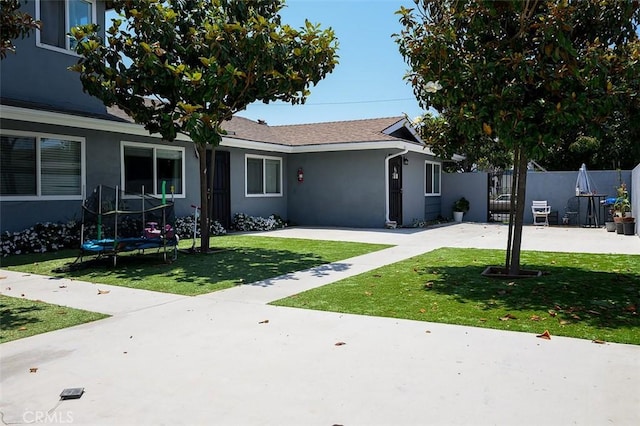 17132 Emerald Ln, Huntington Beach, CA 92647 - single story home featuring stucco siding and a trampoline