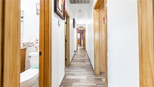 9828 Carob Ave, Fontana, CA 92335 - hall featuring light wood-style floors