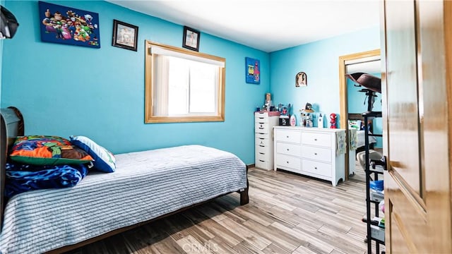 9828 Carob Ave, Fontana, CA 92335 - bedroom with wood finished floors