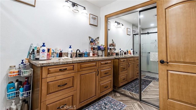 9828 Carob Ave, Fontana, CA 92335 - full bath featuring a shower stall and double vanity