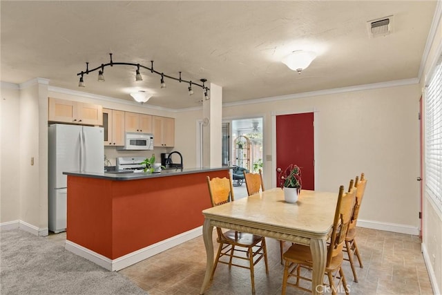 3030 Silverbell Rd, Chico, CA 95973 - dining area featuring baseboards and crown molding