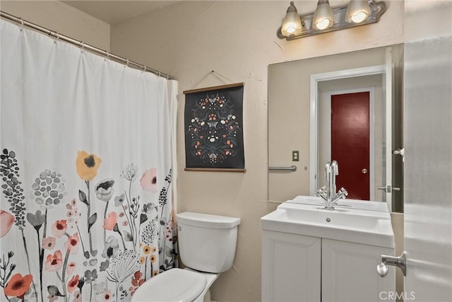 3030 Silverbell Rd, Chico, CA 95973 - full bathroom featuring vanity, toilet, and curtained shower