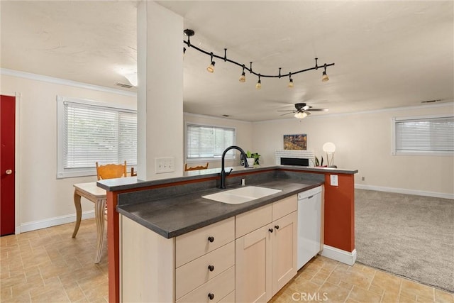 3030 Silverbell Rd, Chico, CA 95973 - kitchen featuring a sink, dishwasher, a ceiling fan, open floor plan, and dark countertops