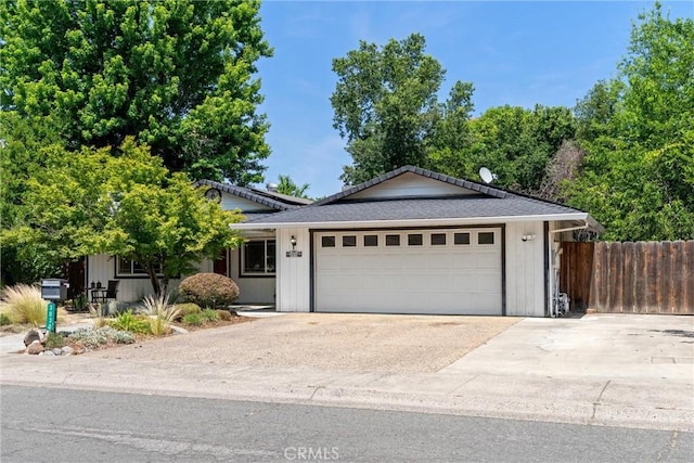 3030 Silverbell Rd, Chico, CA 95973 - ranch-style home with an attached garage and concrete driveway
