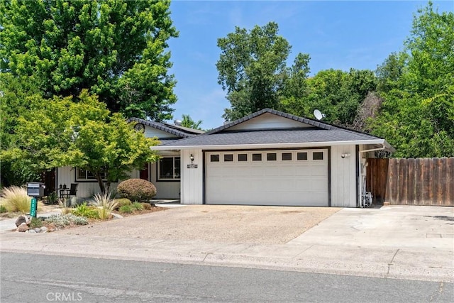 3030 Silverbell Rd, Chico, CA 95973 - ranch-style house featuring a garage and driveway
