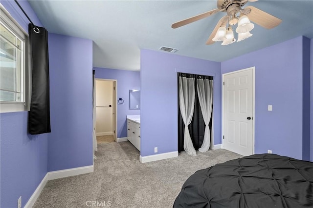 3030 Silverbell Rd, Chico, CA 95973 - bedroom featuring light carpet, baseboards, a ceiling fan, and ensuite bath
