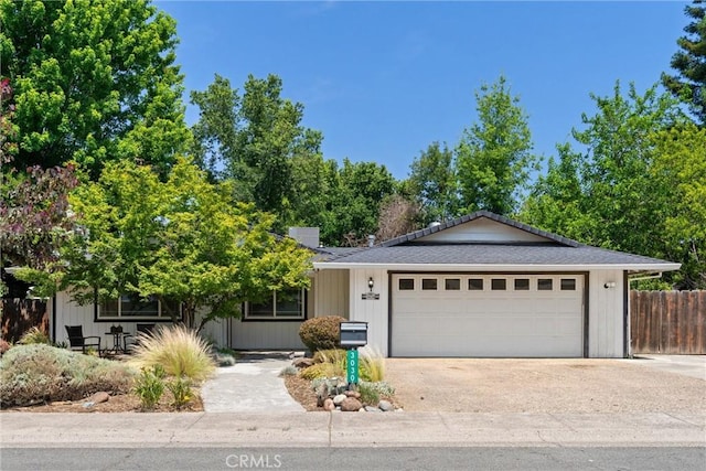 3030 Silverbell Rd, Chico, CA 95973 - single story home featuring a garage and driveway