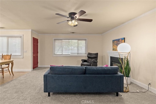 3030 Silverbell Rd, Chico, CA 95973 - carpeted living room featuring ornamental molding, ceiling fan, a brick fireplace, and baseboards