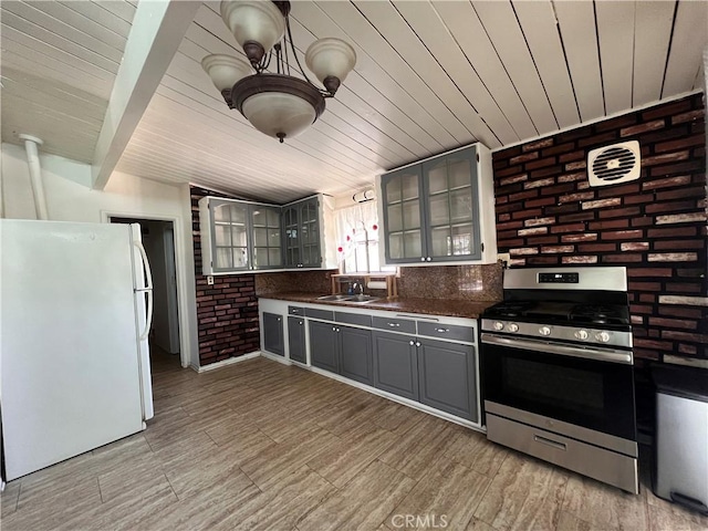 17139 E Newburgh St, Azusa, CA 91702 - kitchen with freestanding refrigerator, gas range, dark countertops, gray cabinets, and wood ceiling