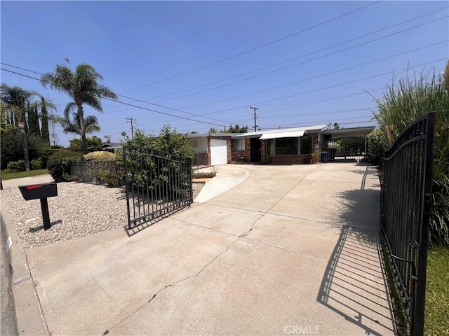 17139 E Newburgh St, Azusa, CA 91702 - view of front facade featuring a gate and concrete driveway