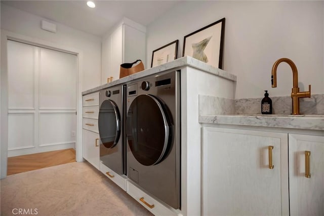 9363 Dinsdale St, Downey, CA 90240 - laundry area with washer and clothes dryer, cabinet space, and recessed lighting