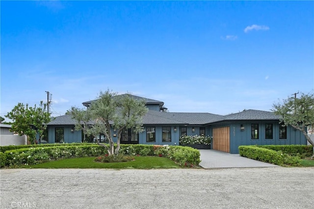 9363 Dinsdale St, Downey, CA 90240 - view of front of house with an attached garage and driveway