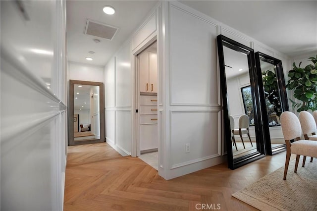 9363 Dinsdale St, Downey, CA 90240 - corridor with a decorative wall and recessed lighting