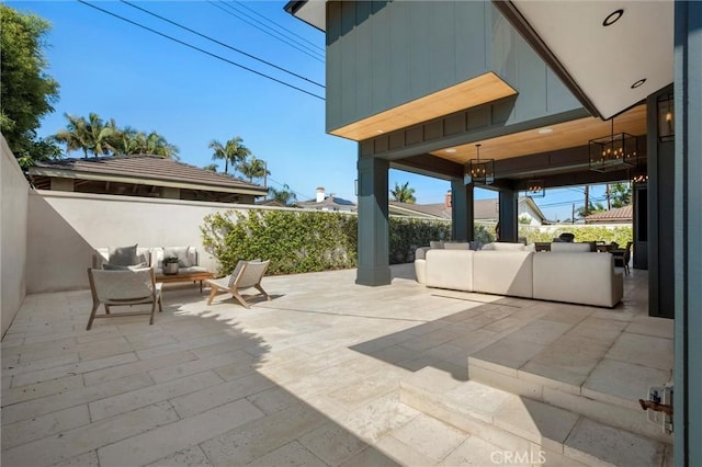 9363 Dinsdale St, Downey, CA 90240 - fenced backyard with a patio area and outdoor lounge area