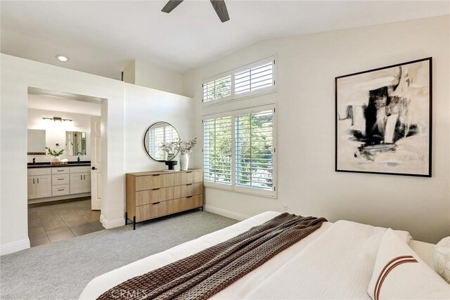 55 Fairfield, Lake Forest, CA 92610 - bedroom featuring light colored carpet, multiple windows, ensuite bath, light tile patterned floors, and recessed lighting