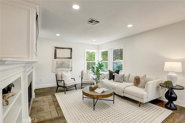 55 Fairfield, Lake Forest, CA 92610 - living room featuring a fireplace, wood finished floors, and recessed lighting