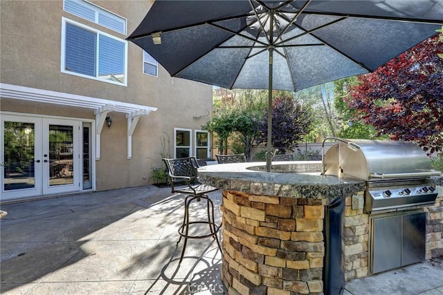 55 Fairfield, Lake Forest, CA 92610 - view of patio with french doors and area for grilling