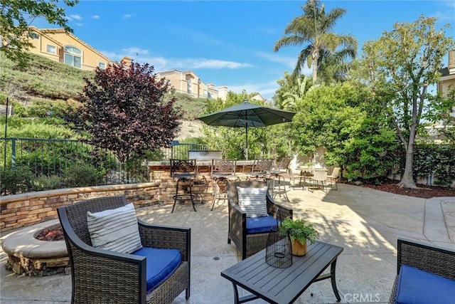 55 Fairfield, Lake Forest, CA 92610 - view of patio with an outdoor living space with a fire pit
