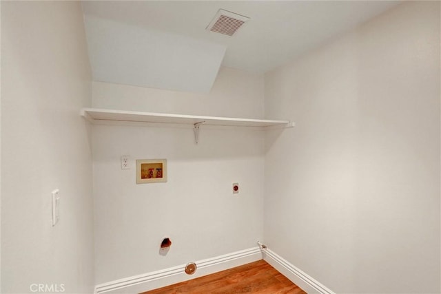55 Fairfield, Lake Forest, CA 92610 - laundry room featuring washer hookup, wood finished floors, gas dryer hookup, and hookup for an electric dryer
