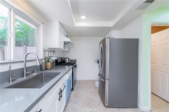 530 Diamond St Unit C, Monrovia, CA 91016 - kitchen with appliances with stainless steel finishes, white cabinets, a tray ceiling, and recessed lighting