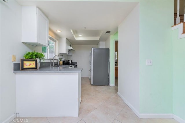 530 Diamond St Unit C, Monrovia, CA 91016 - kitchen with freestanding refrigerator, white cabinetry, range, a raised ceiling, and light tile patterned floors