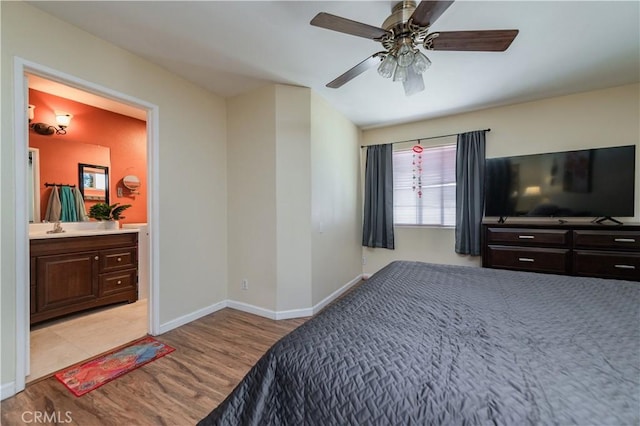 530 Diamond St Unit C, Monrovia, CA 91016 - bedroom featuring light wood-style flooring, a sink, baseboards, and a ceiling fan
