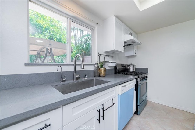 530 Diamond St Unit C, Monrovia, CA 91016 - kitchen featuring stainless steel gas range, under cabinet range hood, light stone counters, white cabinetry, and white dishwasher