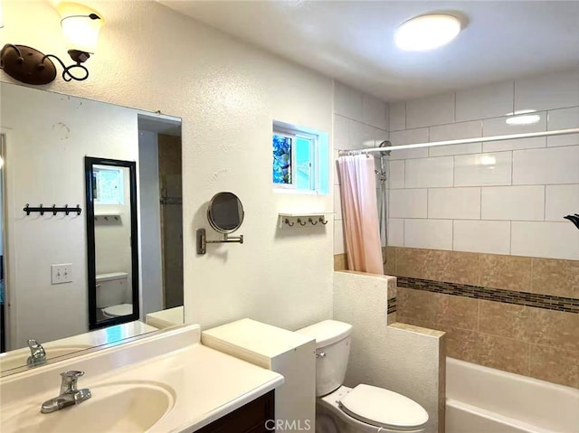 530 Diamond St Unit C, Monrovia, CA 91016 - bathroom featuring vanity, shower / bath combo, and a textured wall