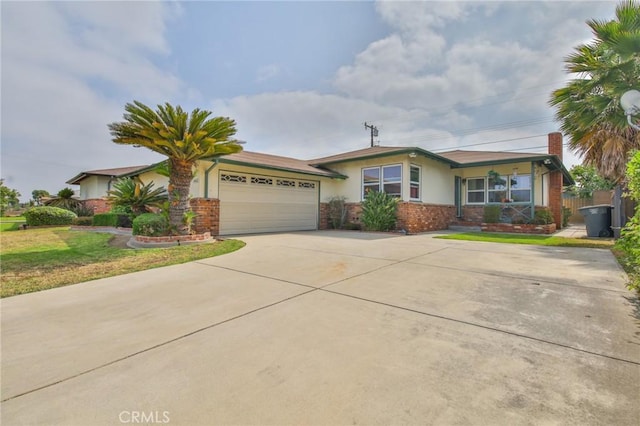 14012 S Wilkie Ave, Gardena, CA 90249 - single story home featuring an attached garage, stucco siding, driveway, a chimney, and a front lawn