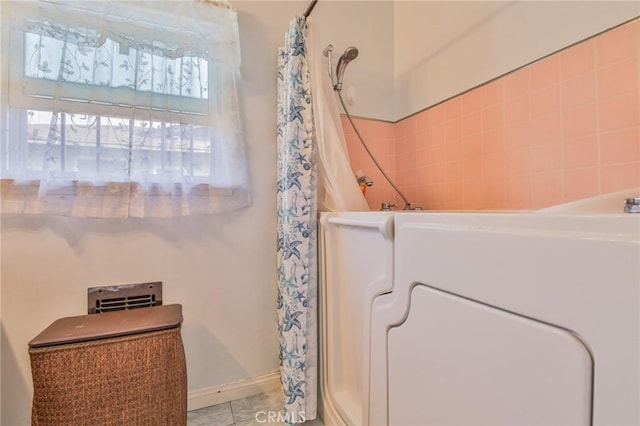14012 S Wilkie Ave, Gardena, CA 90249 - full bath featuring a shower with curtain and tile patterned flooring