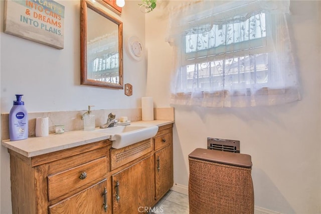 14012 S Wilkie Ave, Gardena, CA 90249 - bathroom with vanity, plenty of natural light, and tile patterned floors