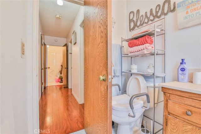 14012 S Wilkie Ave, Gardena, CA 90249 - bathroom featuring wood finished floors and vanity
