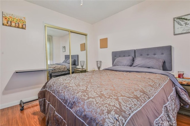 14012 S Wilkie Ave, Gardena, CA 90249 - bedroom with wood finished floors and a closet