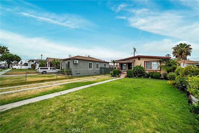 633 E 136th St, Los Angeles, CA 90059 - view of front facade with stucco siding