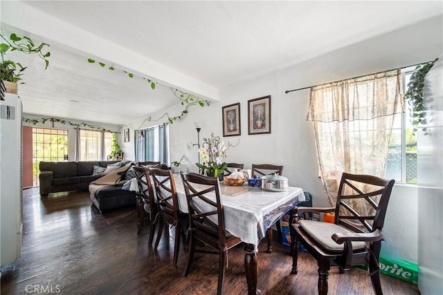 633 E 136th St, Los Angeles, CA 90059 - dining space featuring wood finished floors and beam ceiling