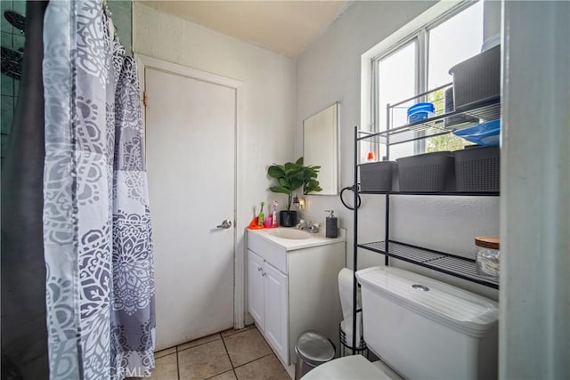 633 E 136th St, Los Angeles, CA 90059 - bathroom with vanity, tile patterned floors, and a shower with curtain