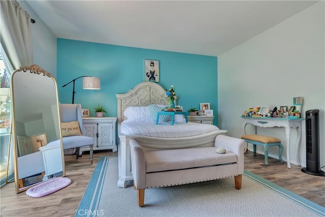 11244 Sega Ln, Fontana, CA 92337 - bedroom featuring wood finished floors