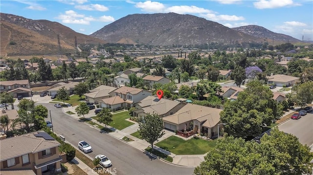 11244 Sega Ln, Fontana, CA 92337 - aerial view of residential area featuring a mountainous background