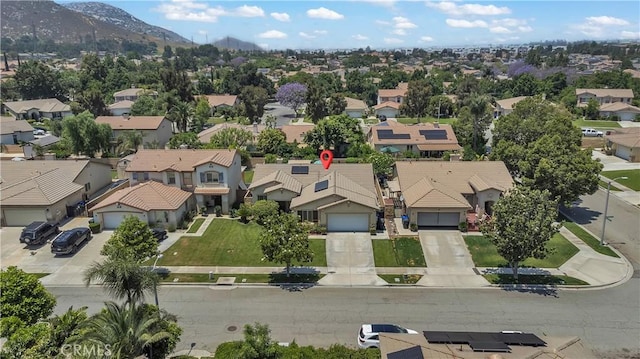 11244 Sega Ln, Fontana, CA 92337 - aerial view of residential area featuring a mountain backdrop