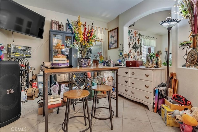 11244 Sega Ln, Fontana, CA 92337 - tiled dining room featuring arched walkways