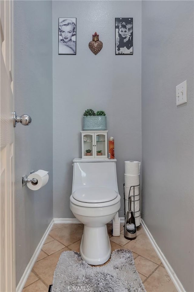 11244 Sega Ln, Fontana, CA 92337 - bathroom featuring tile patterned flooring and toilet