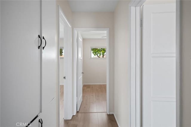 150 E 232nd St, Carson, CA 90745 - hall featuring light wood-type flooring and baseboards