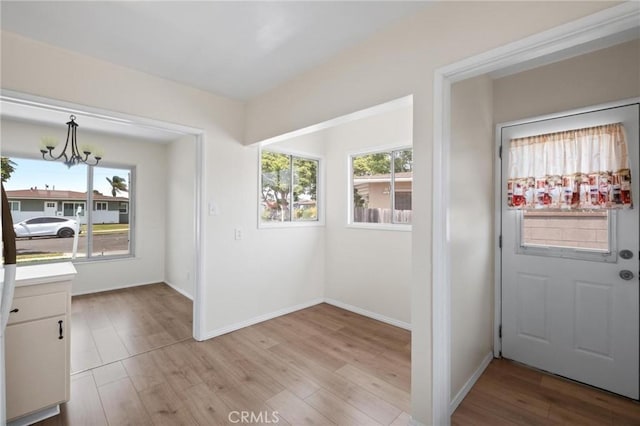 150 E 232nd St, Carson, CA 90745 - unfurnished dining area with light wood-style flooring
