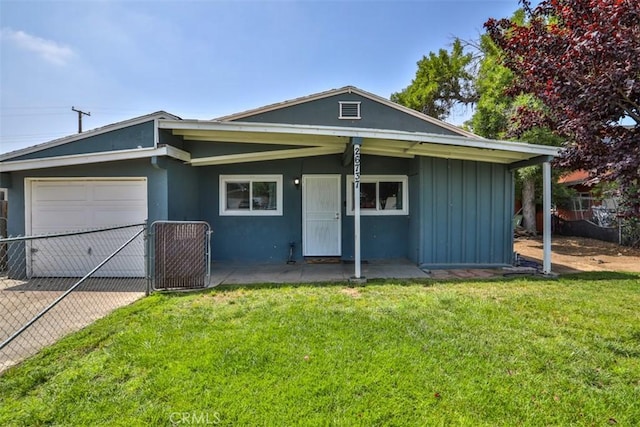 26737 Cypress St, Highland, CA 92346 - view of front of house with an attached garage, board and batten siding, driveway, a gate, and central air condition unit